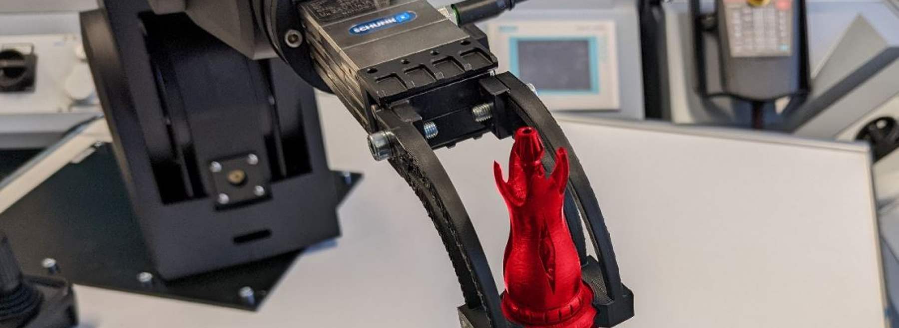 Das Bild veranschaulicht den Demonstrator 3D-Druck zur Entwicklung und Herstellung individueller und gewichtsoptimierter Robotergreifer.